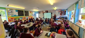 Presenter, presenting an Internet Safety Seminar to Primary School Students