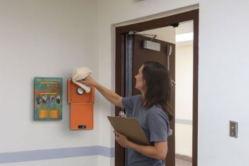 Cleaning, testing and troubleshooting a wall unlocking device.